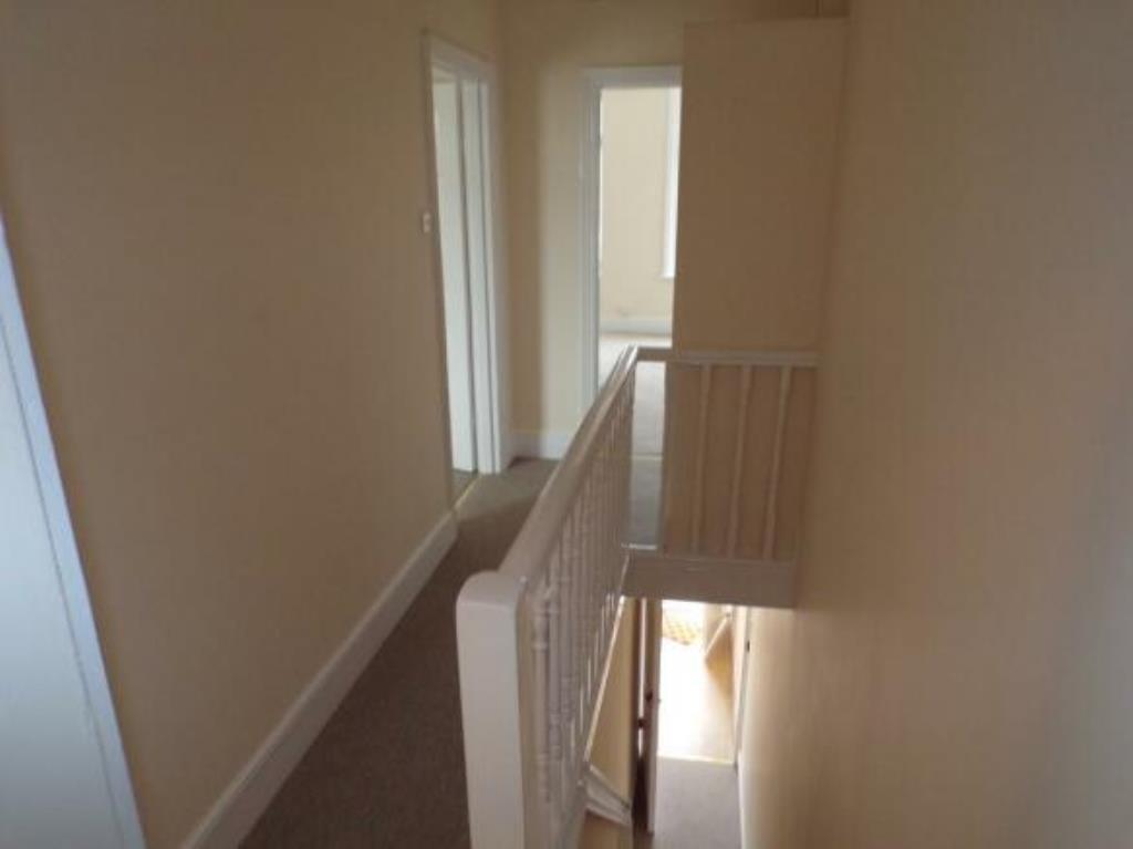 Lot: 155 - A PAIR OF TWO-BEDROOM FLATS FOR INVESTMENT - Library Photo of the communal landing when vacant